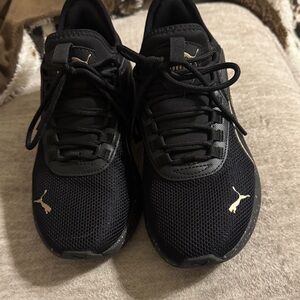 Puma Black Trainers with Gold Puma Accents
